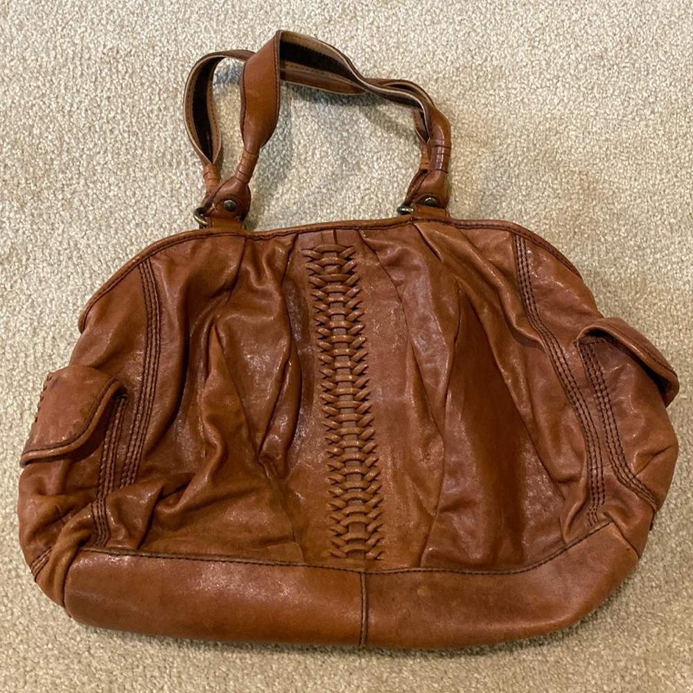 Lucky Brand Leather bag with woven details and great pockets.